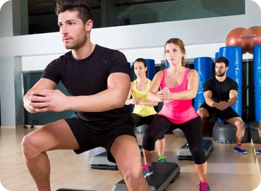 A group of people doing workouts