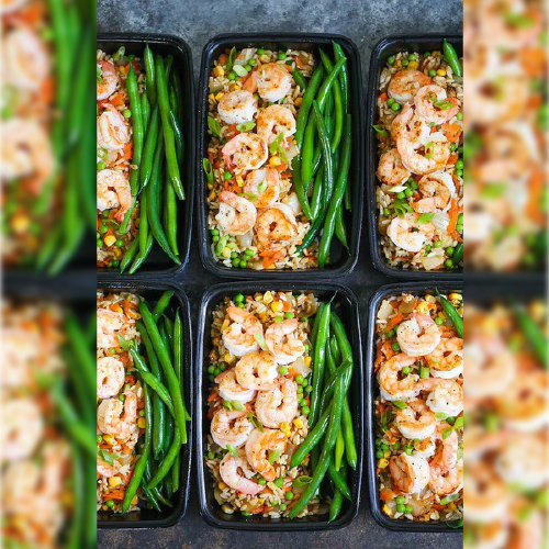 Food containers with healthy rice meals with seafood and beans
